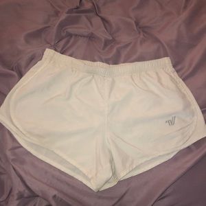 White shorts size YL.